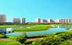 Jaypee Greens_a large body of water surrounded by tall buildings